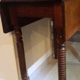 Wooden table with extensions