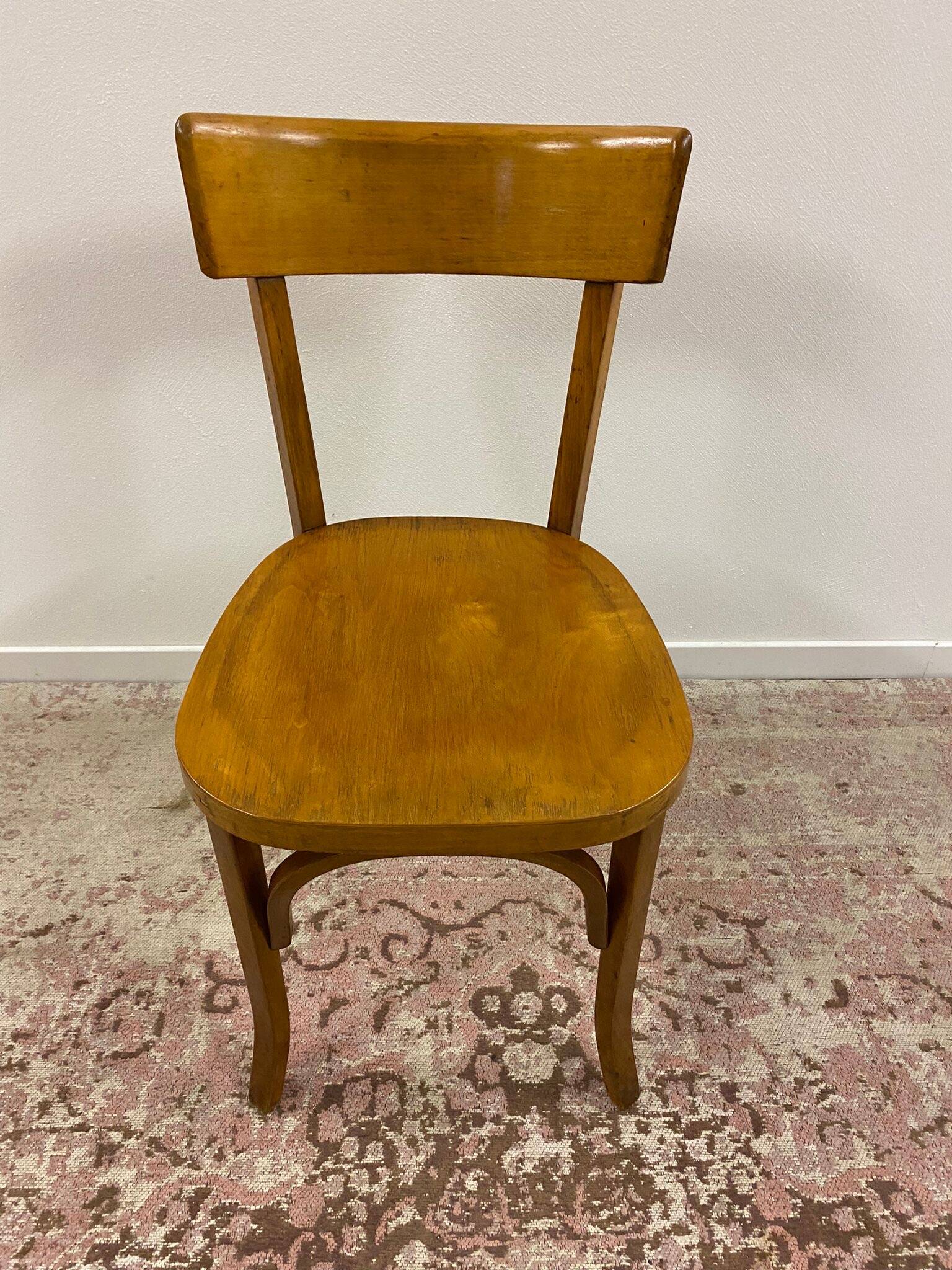 Set of 6 mismatched bistro chairs including Baumann and Luterma chairs