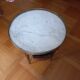 Hot water bottle pedestal table