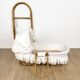 Bamboo bassinet on a stand, bohemian 1970s.