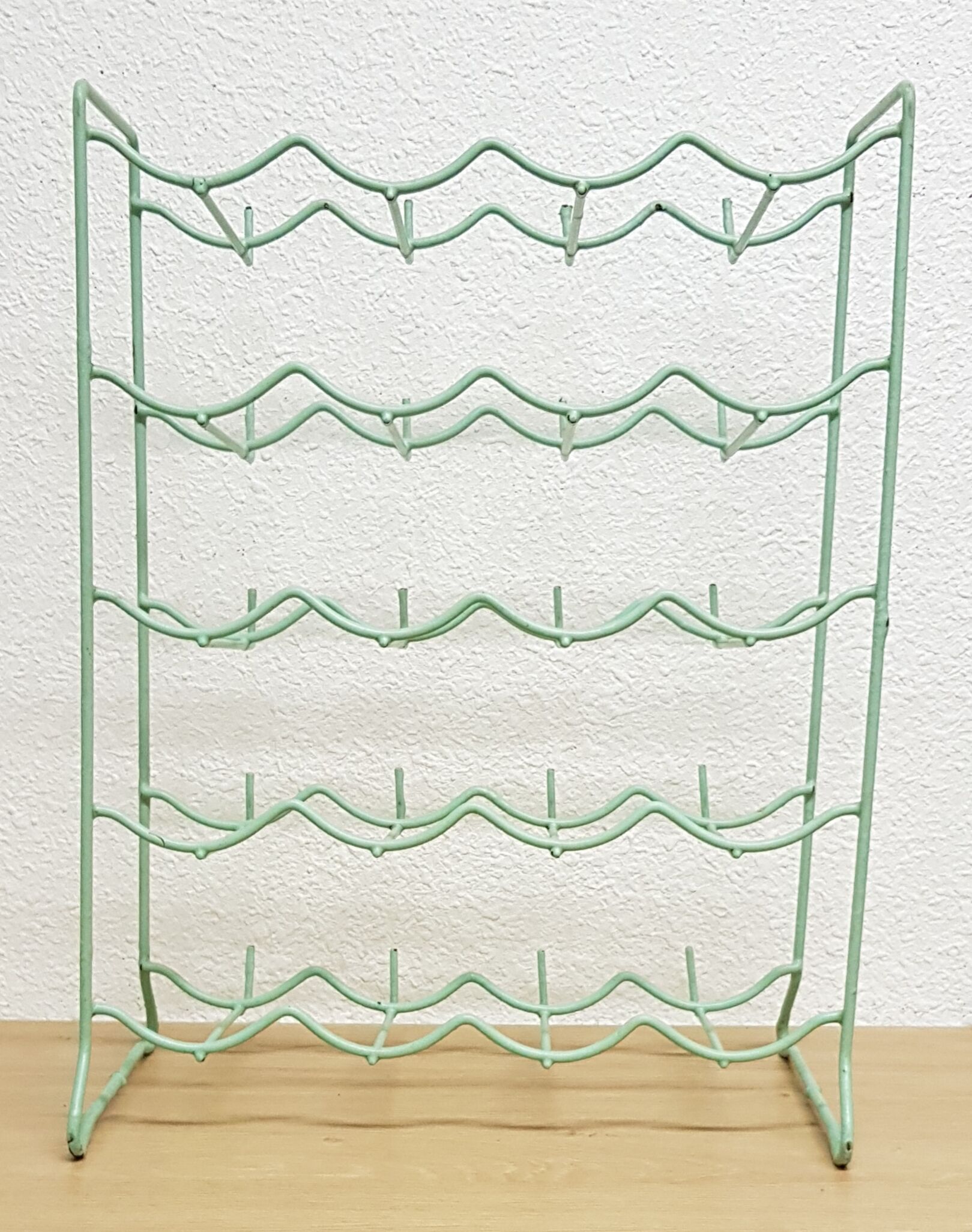 Metal aqua green bottle rack