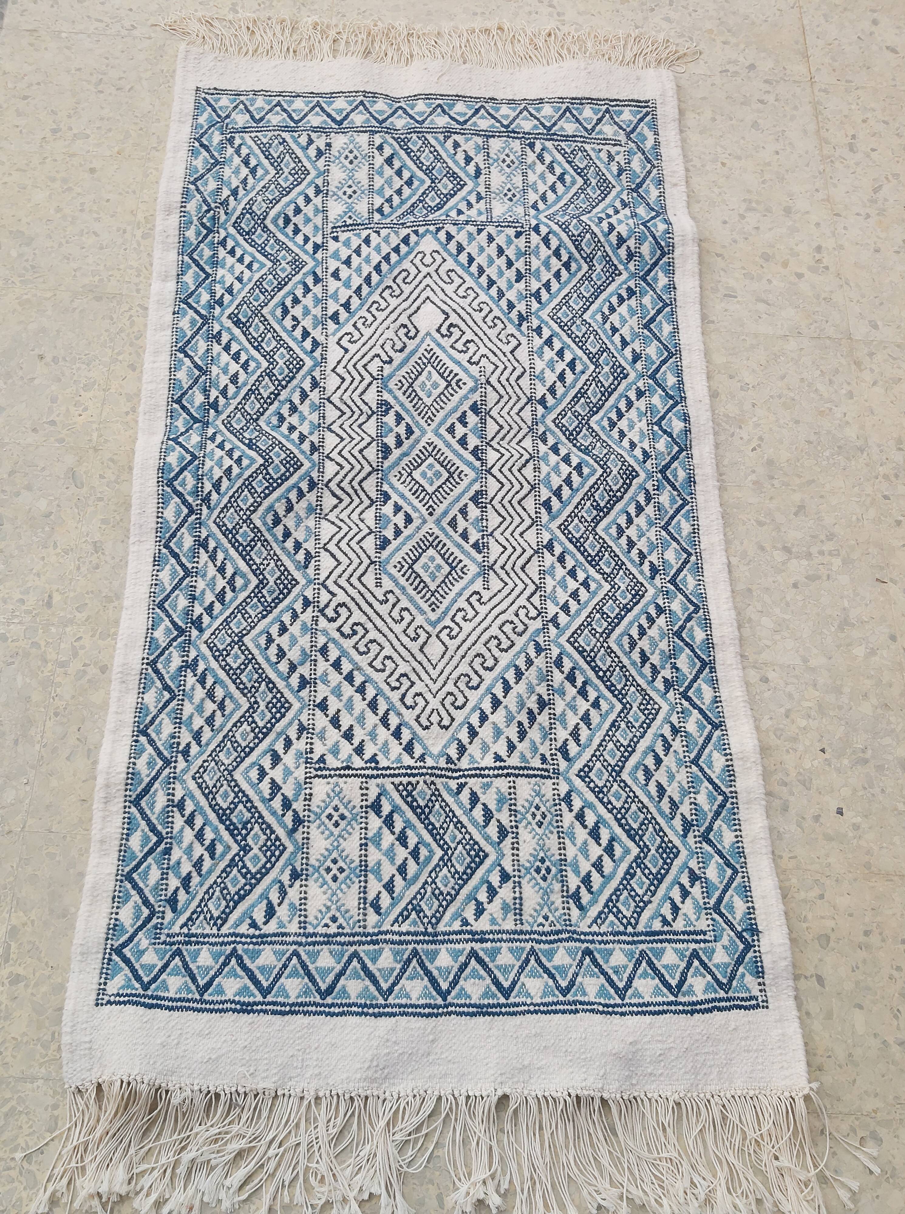 Traditional handmade white and blue margoum rug