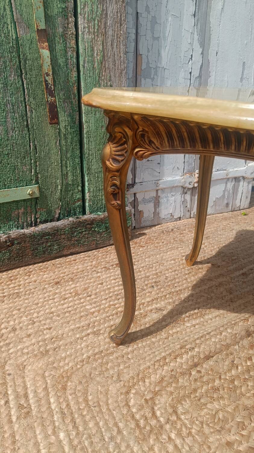 Vintage side table in gilded brass with an onyx top.