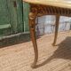 Vintage side table in gilded brass with an onyx top.