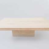 A vintage travertine coffee table