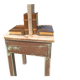 Wooden trompe-l'œil bookends with a book and box