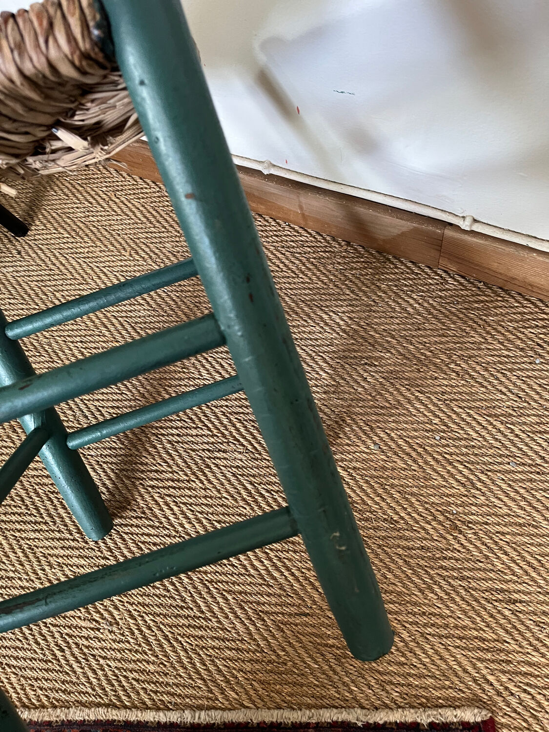 Vintage stool in green patinated wood and straw