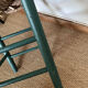 Vintage stool in green patinated wood and straw
