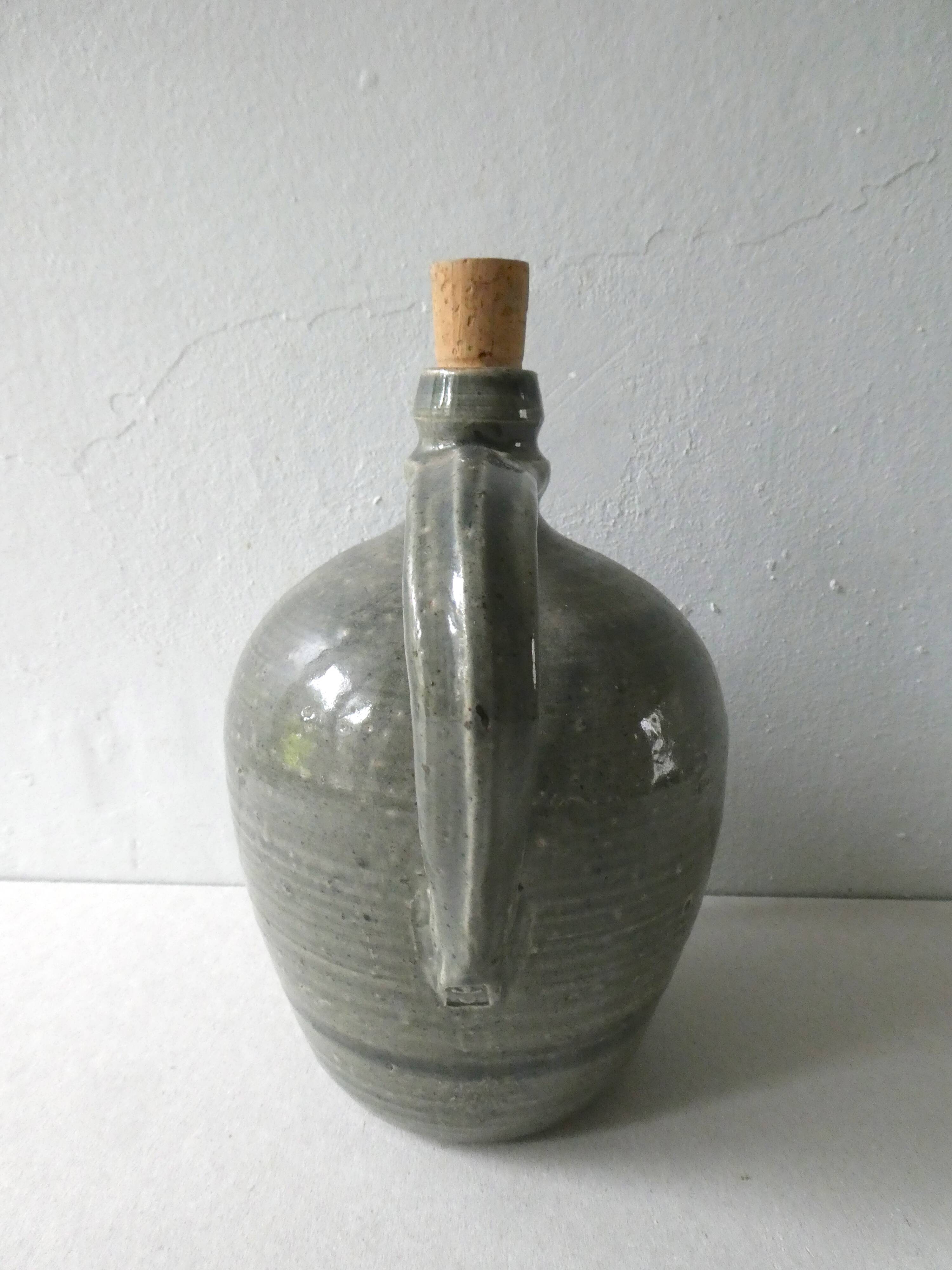 Bouteille en grès vernissé