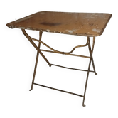 Folding wrought iron garden bistro table