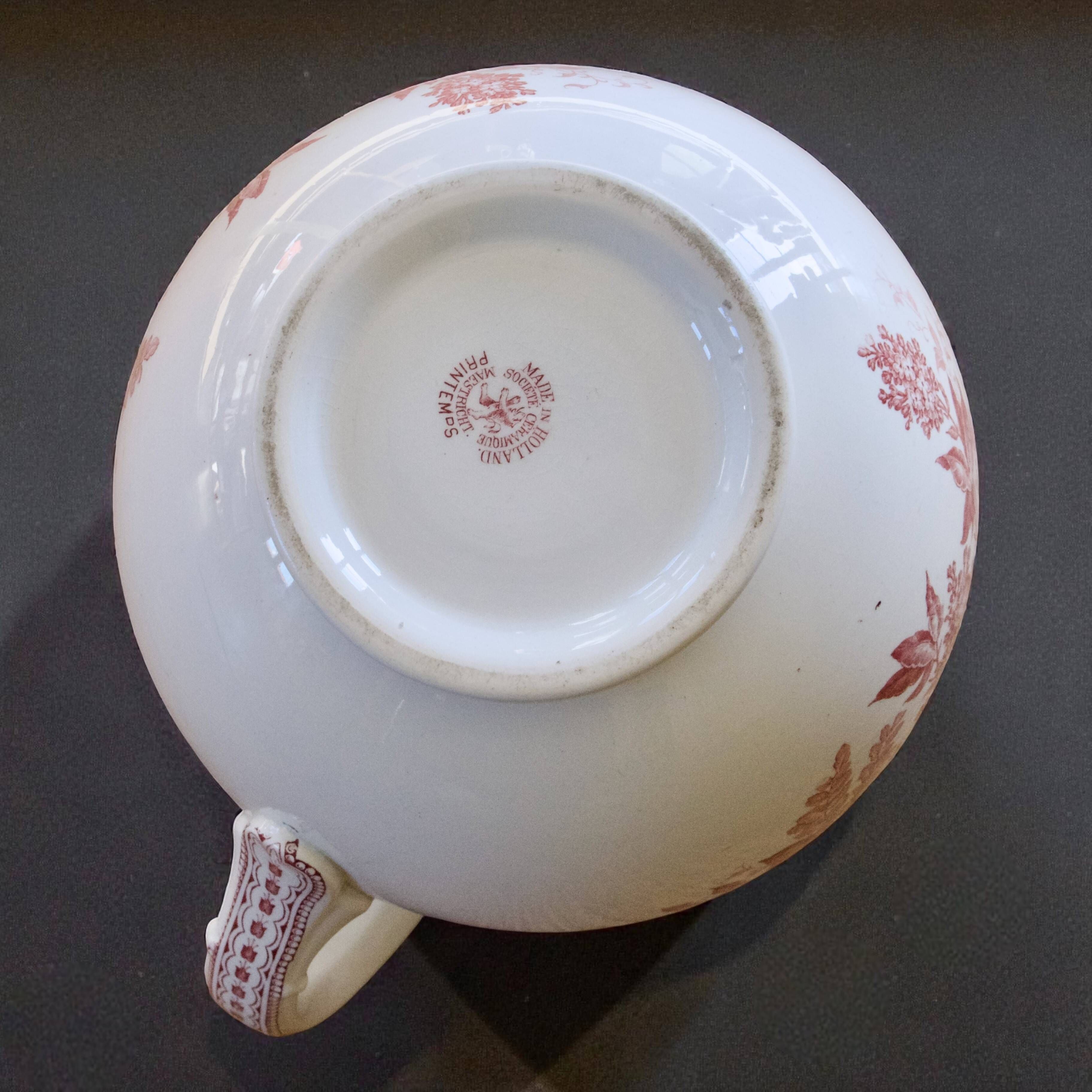 Large 19th-century earthenware vase signed Maestricht, Spring collection.