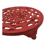 Burgundy cast iron trivet