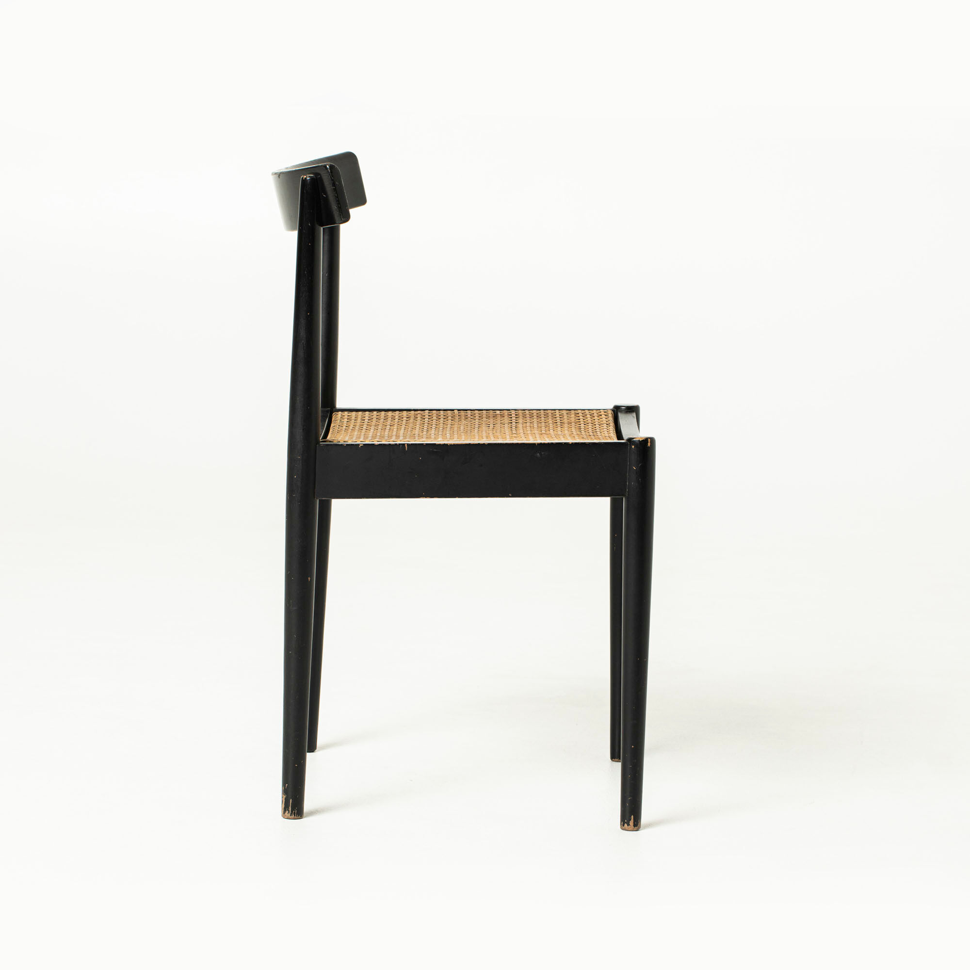 Mid-century dining chair in black laquered wood and cane