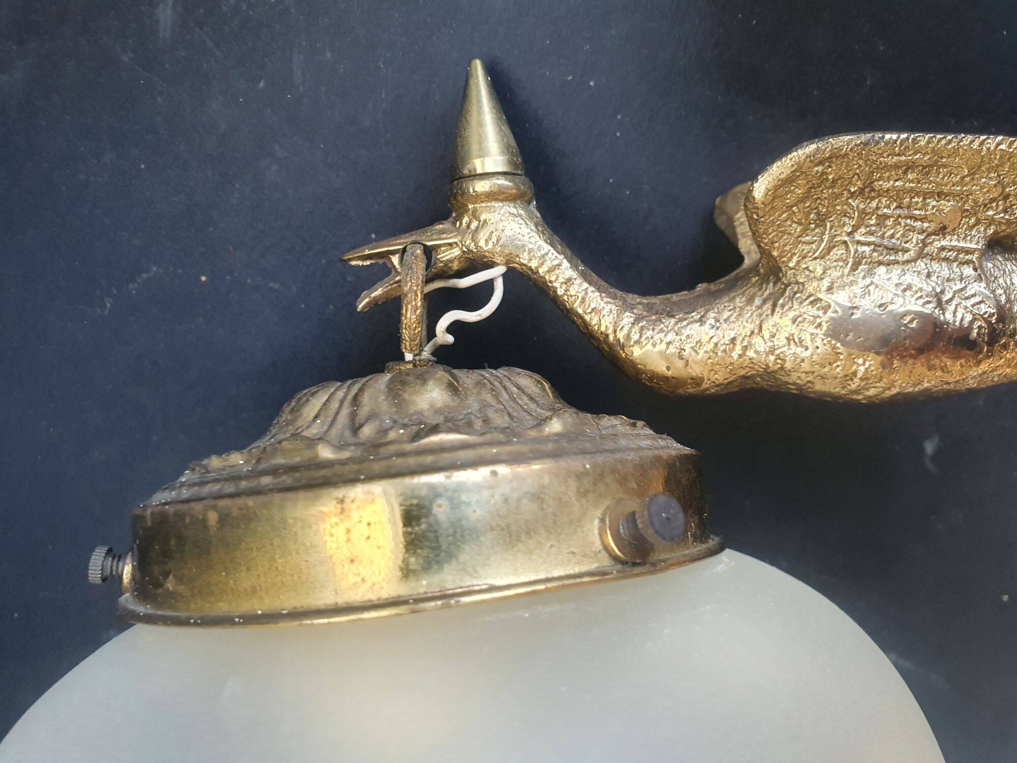 Pair of antique bronze wall sconces