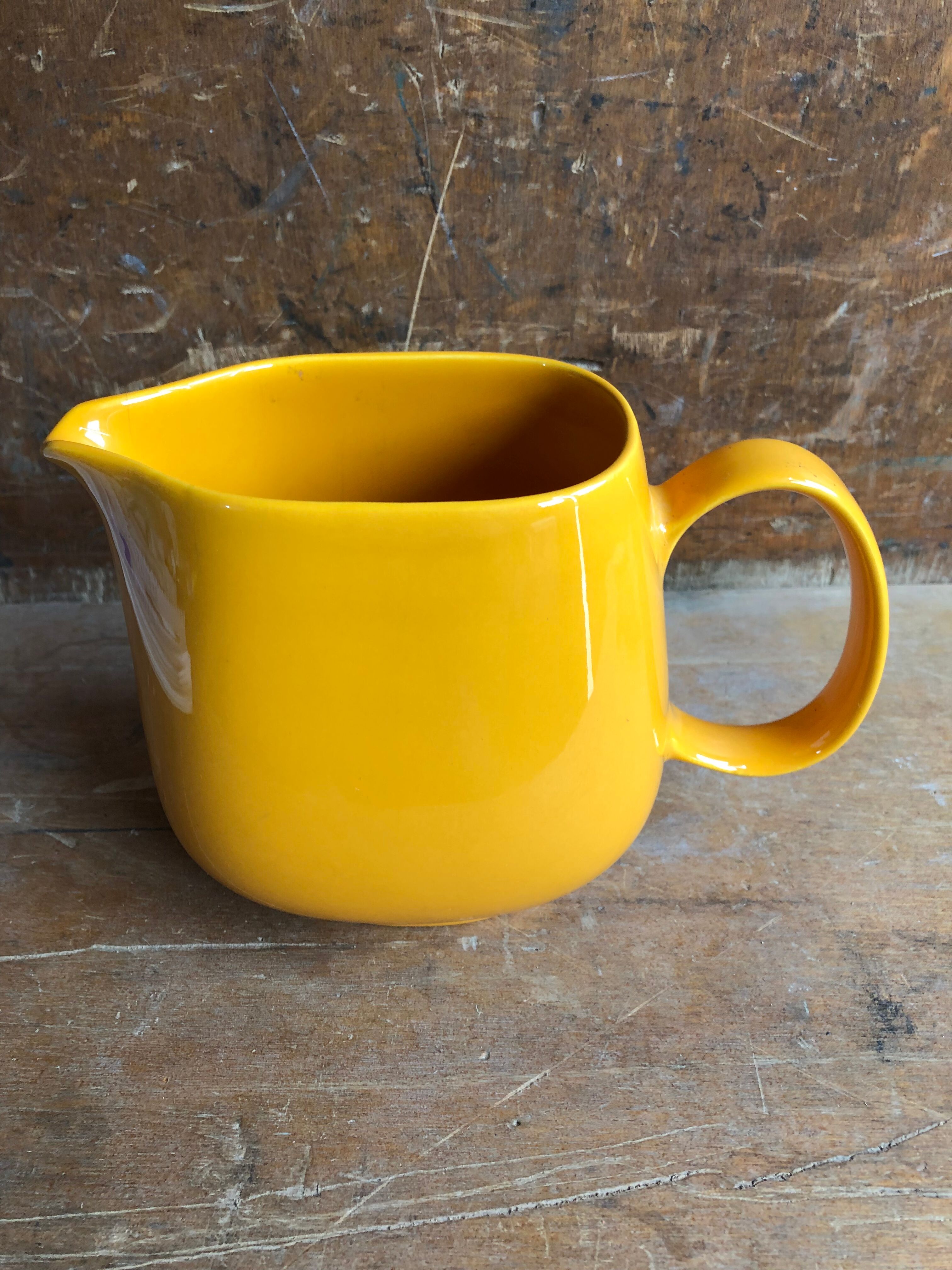 Old yellow ceramic pitcher made in germany 70s vintage