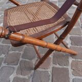 Bamboo folding chair and caning, leather and brass