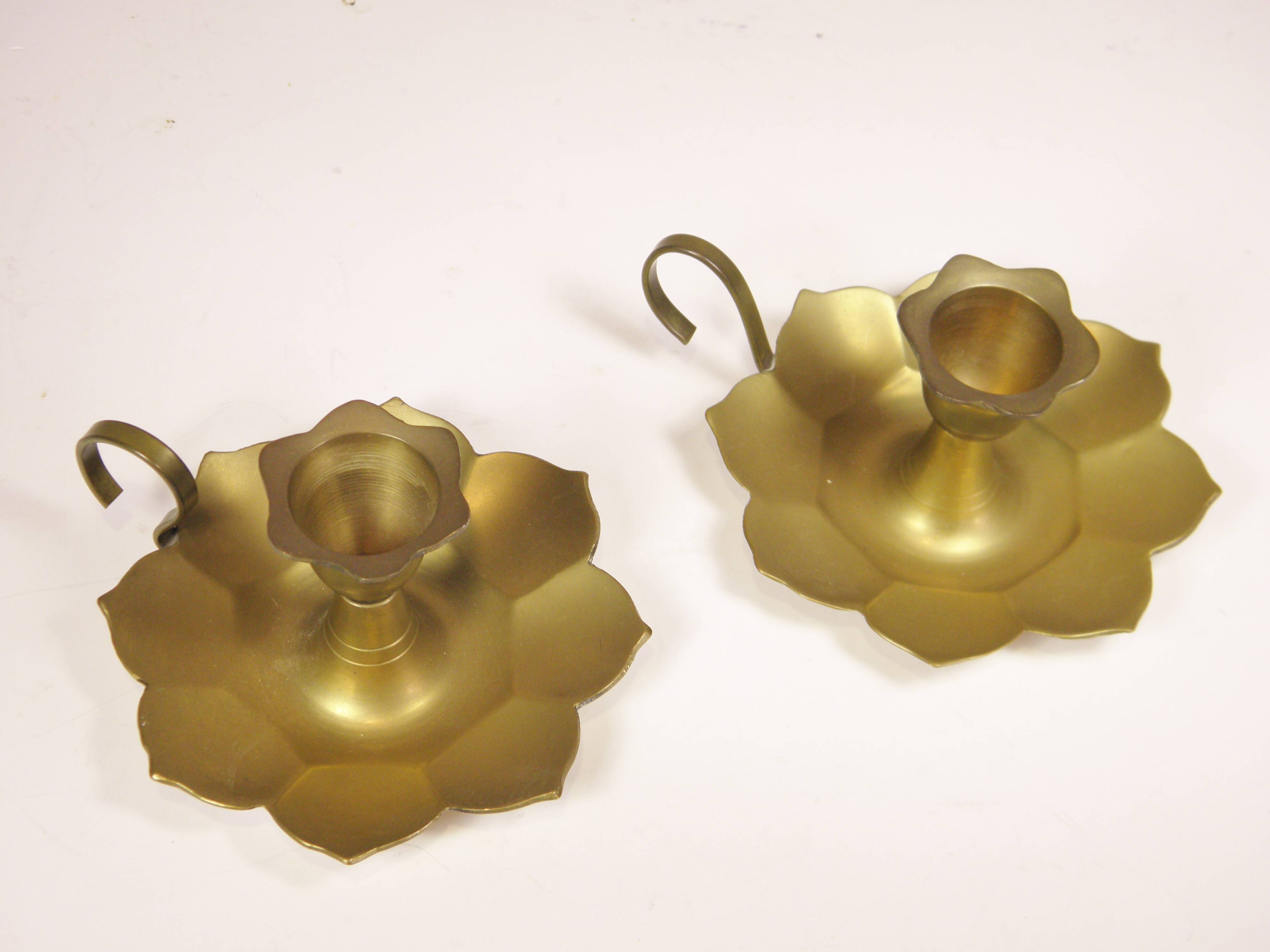 Pair of brass "flower" candlesticks