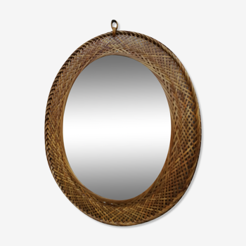 Oval wicker mirror