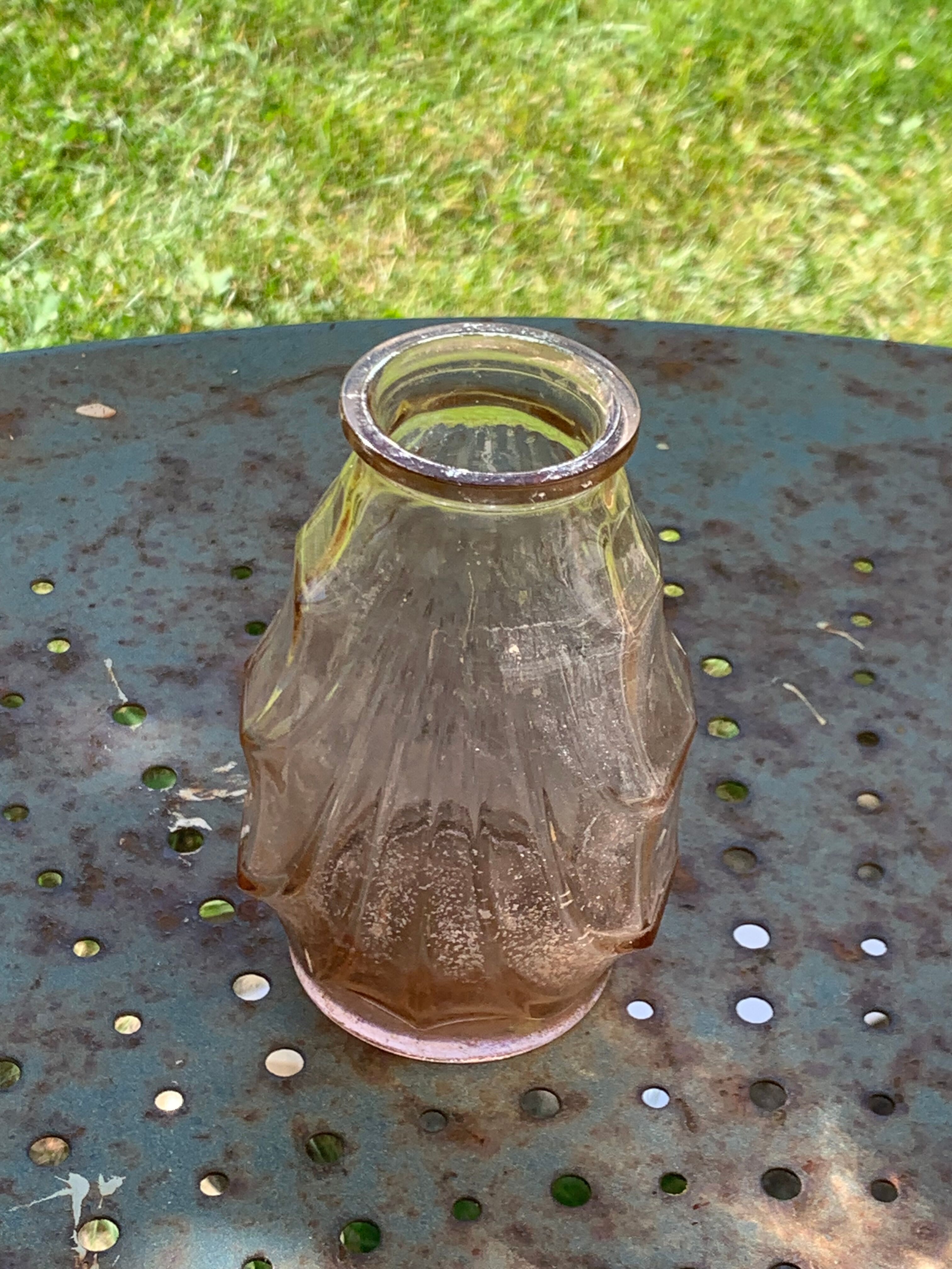 has a hyacinth in pink glass, art deco molded glass
