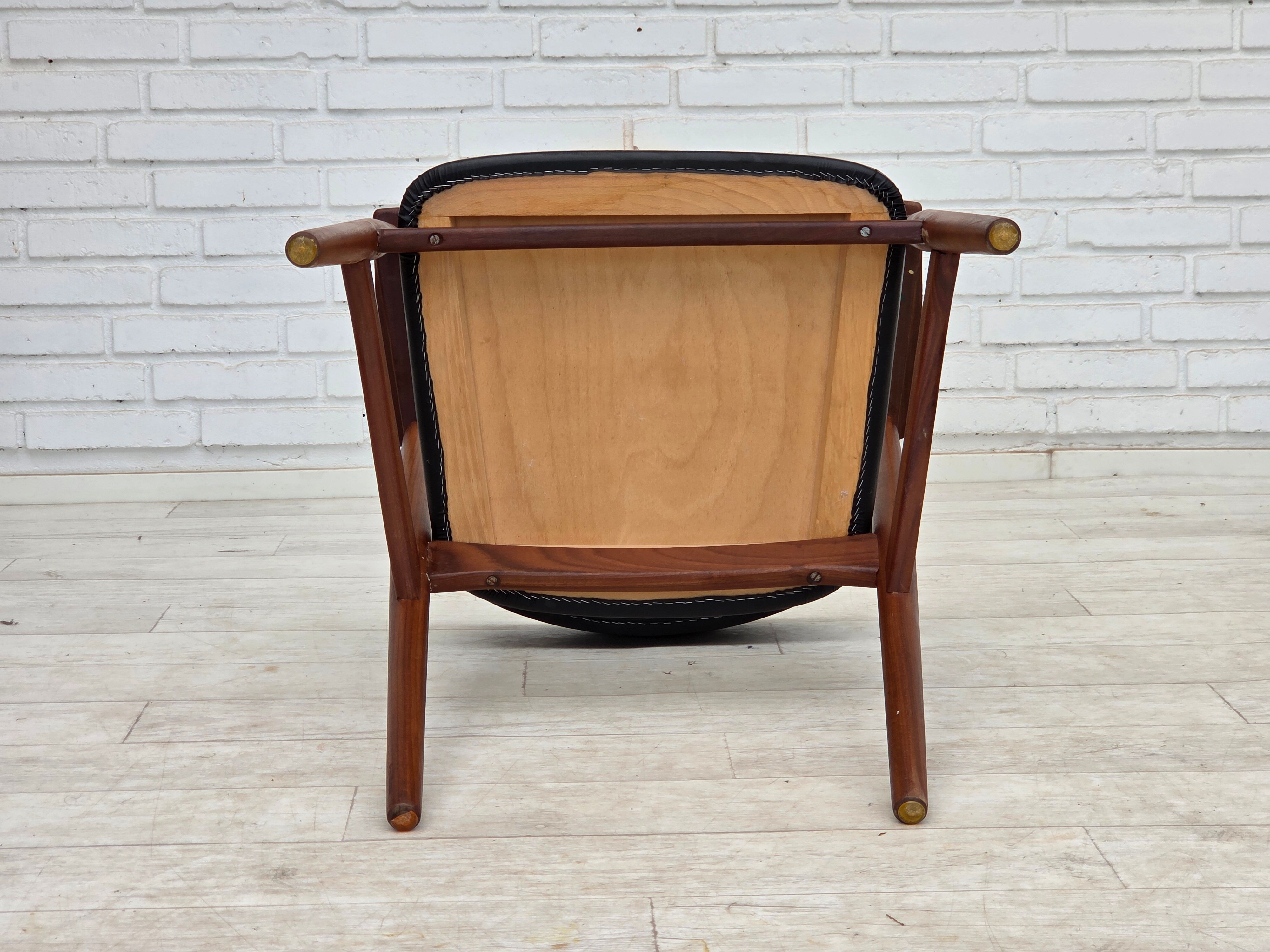 1960s, Danish armchair. Teak wood, black artificial leather.