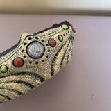 Art Nouveau pocket emptier
