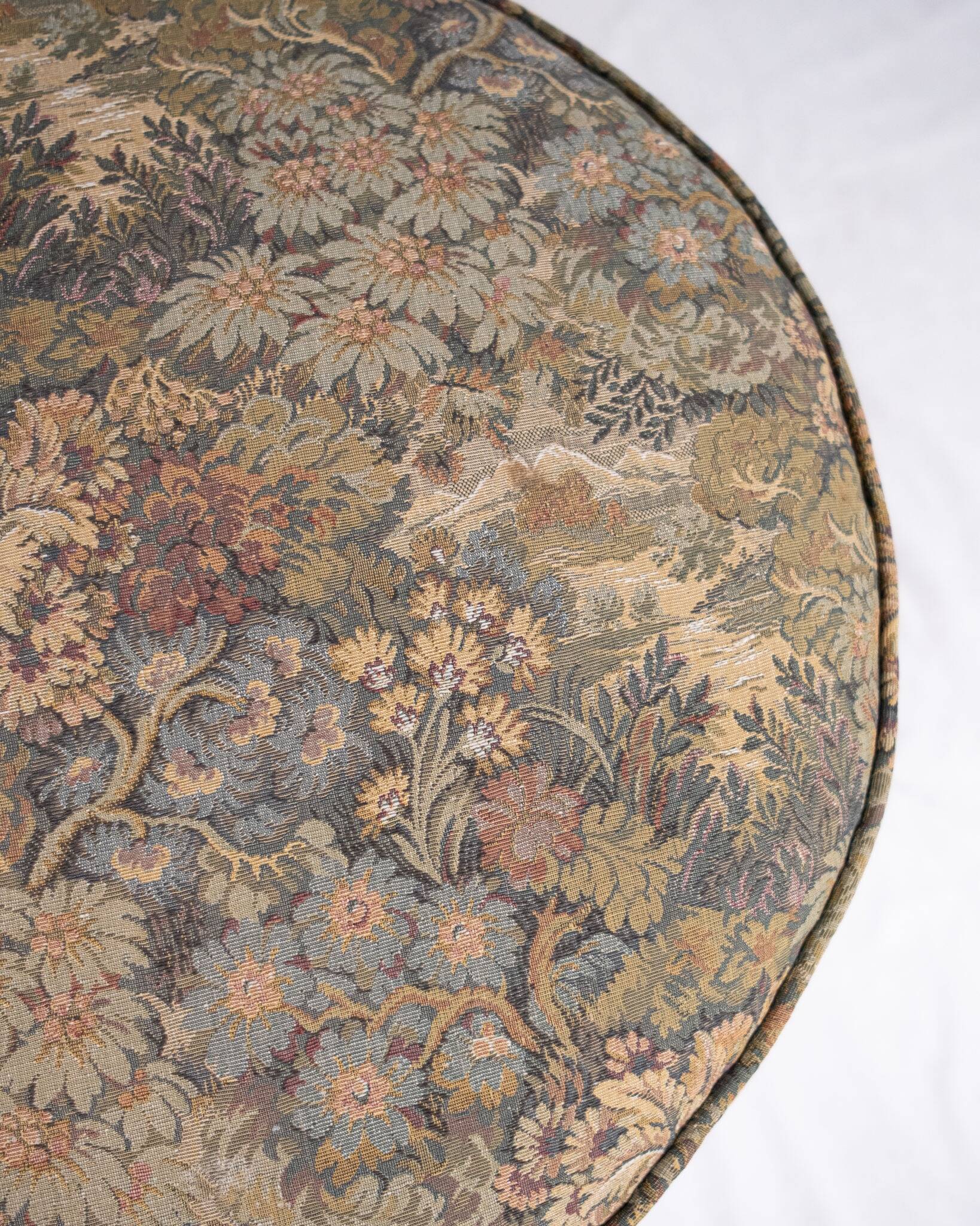 Upholstered pouf in verdure tapestry style, France, late 19th century.