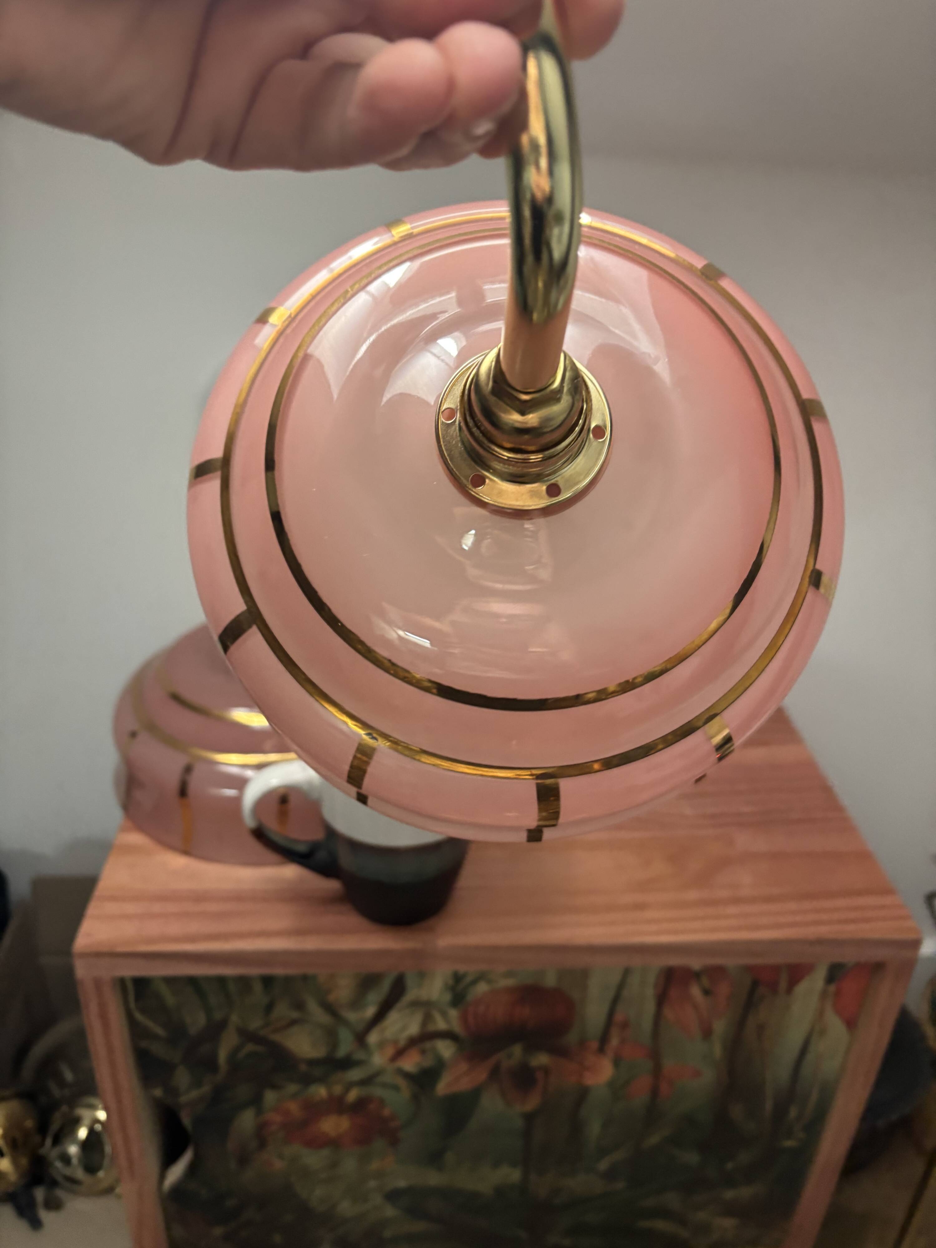 Pair of white ceramic wall lights with pink glass