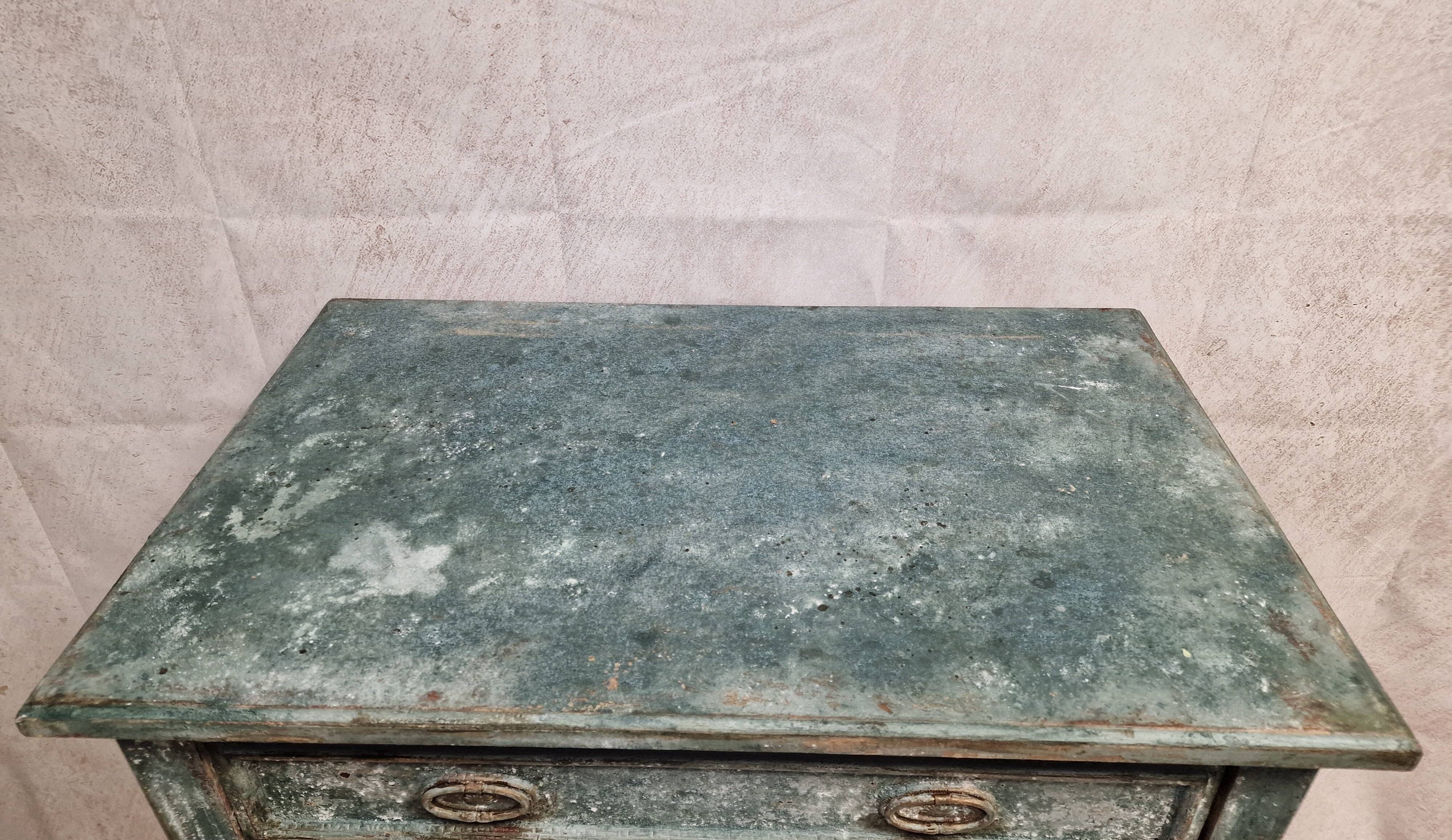 Small patinated chest of drawers