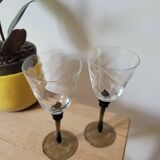 Two smoked black stem wine glasses