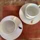 Two monastic porcelain cups
