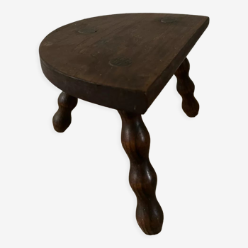 Wooden tripod farm stool