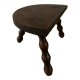 Wooden tripod farm stool