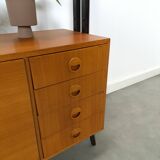 Armoire design en teck Musterring avec pieds noirs