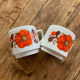 Vintage cups toghana orange flower