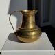 Carafe or metal jug with a rounded body H18