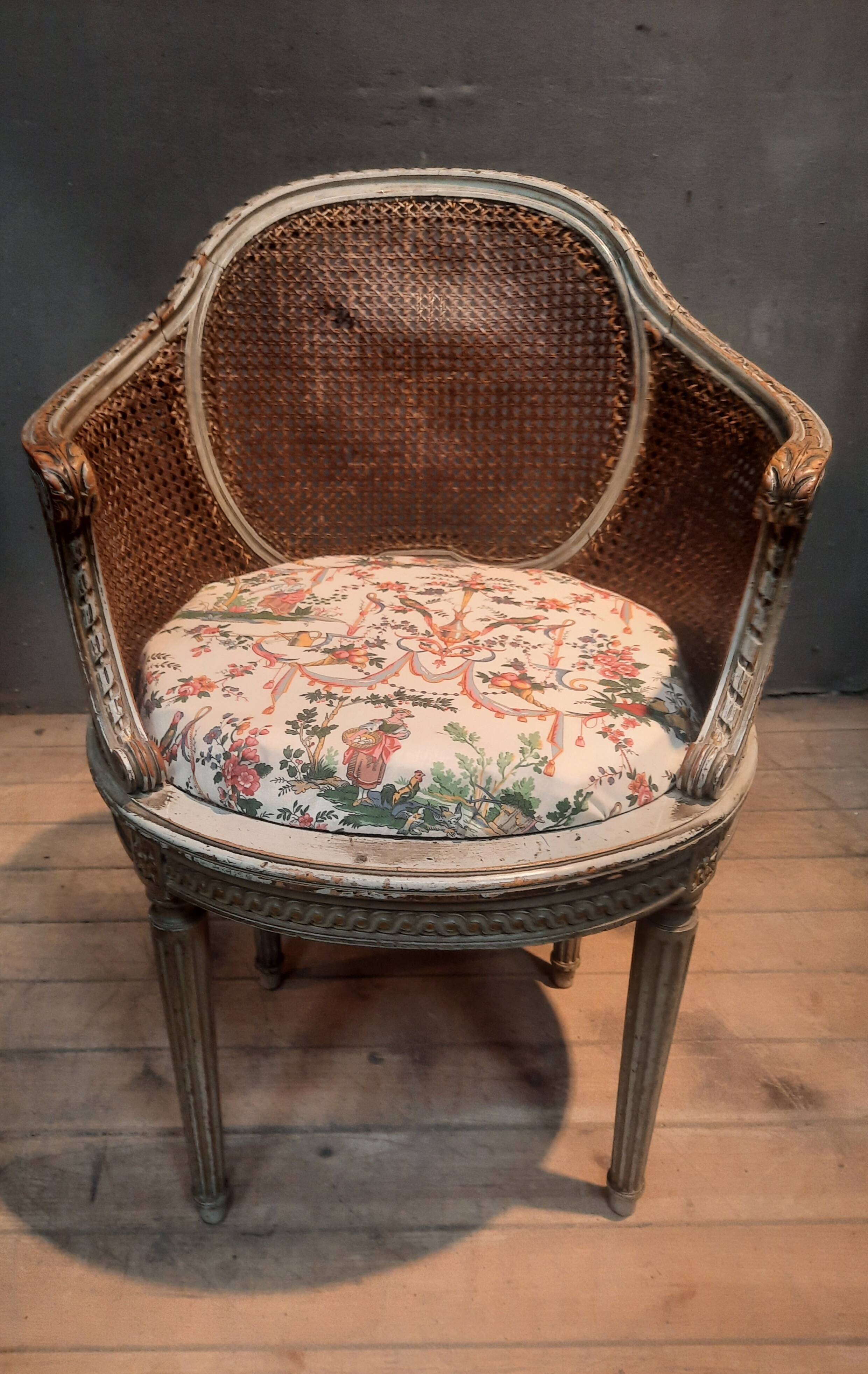 Caned armchair in Louis XVI style