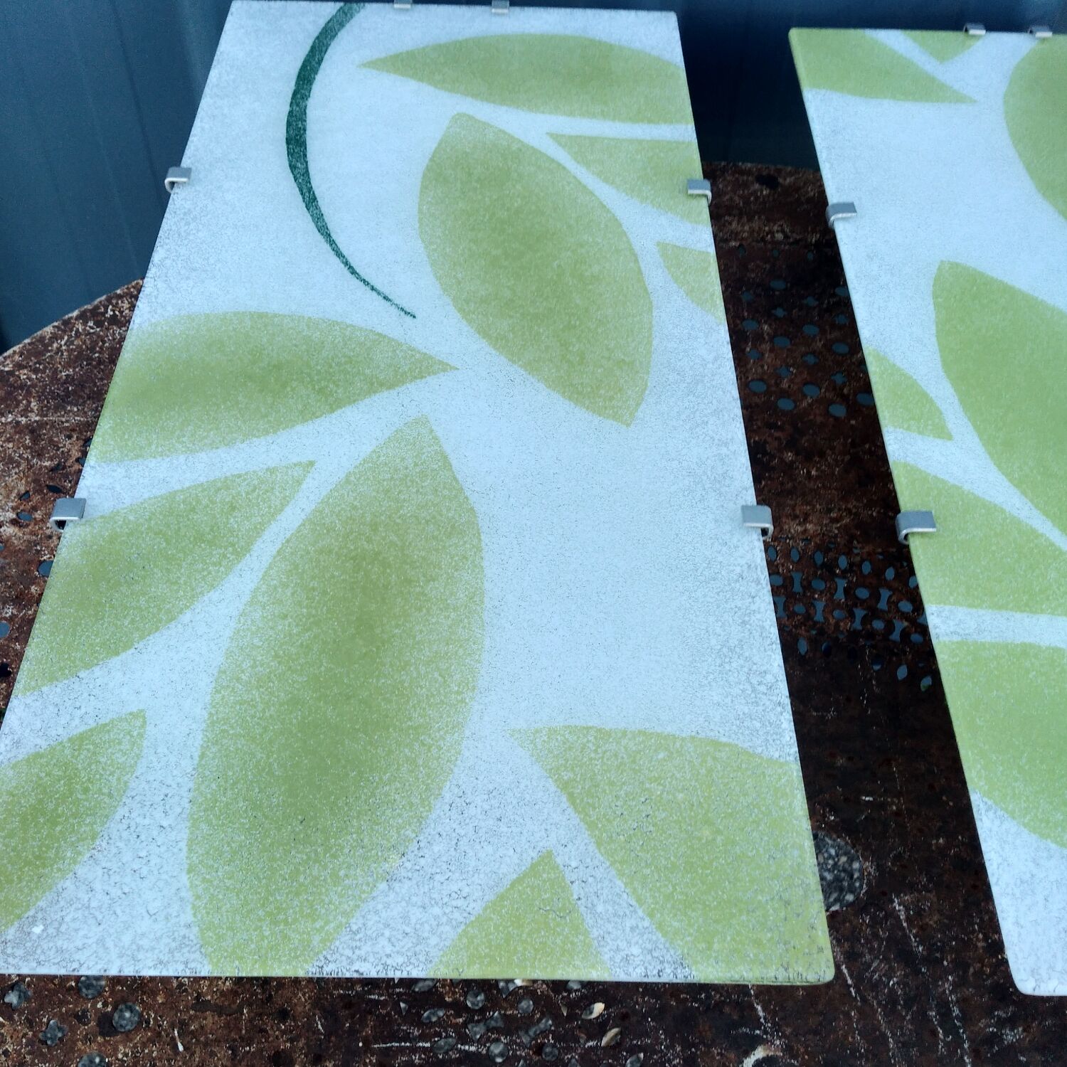 Pair of Gyllen glass wall lamps