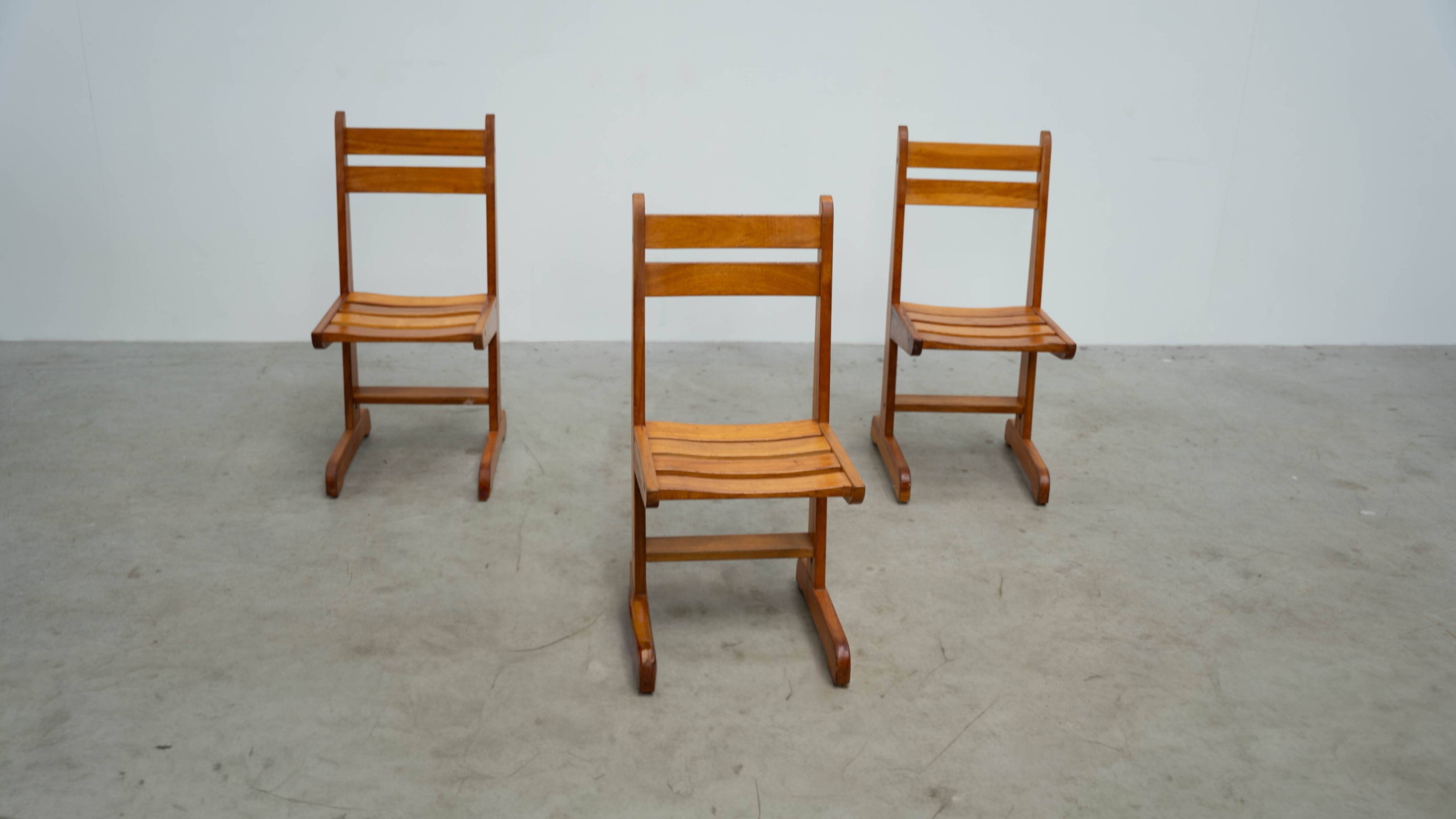 Set of six sculptural oak dining chairs