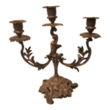 Antique metal candlestick with three branches