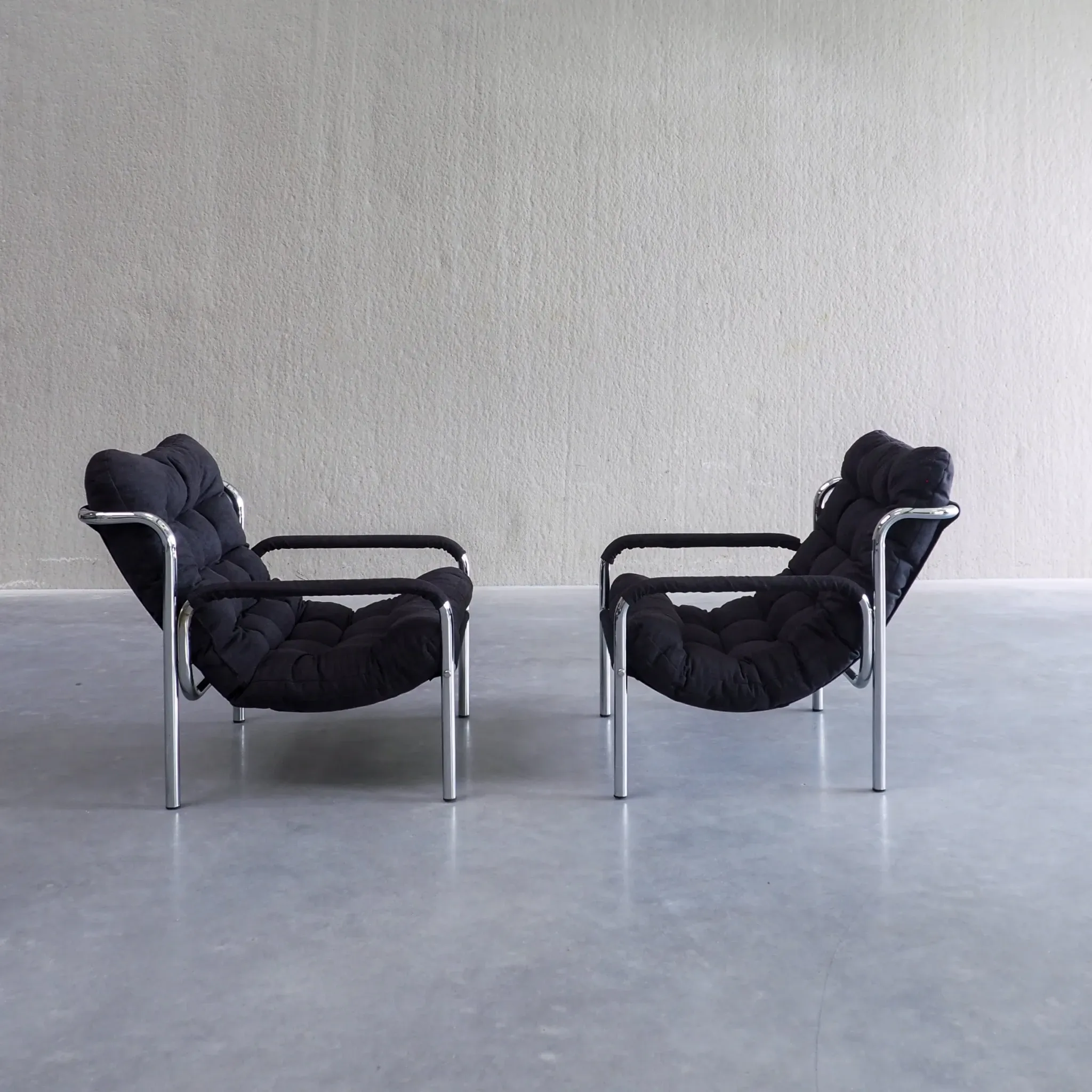 Pair of mid-century modern tubular lounge chairs