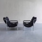Pair of mid-century modern tubular lounge chairs