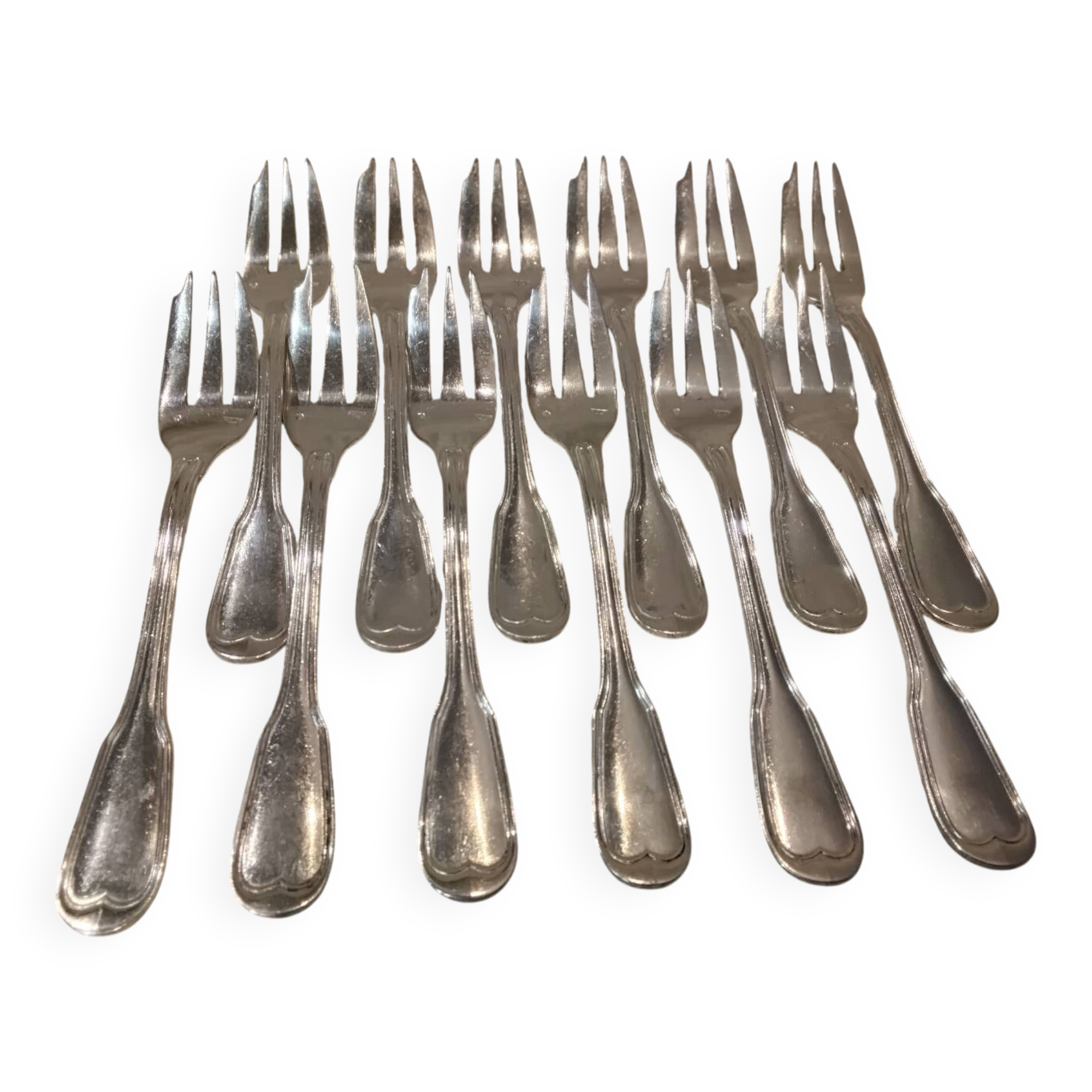 12 silver-plated metal cake forks by Argental silversmiths with a decorative pattern