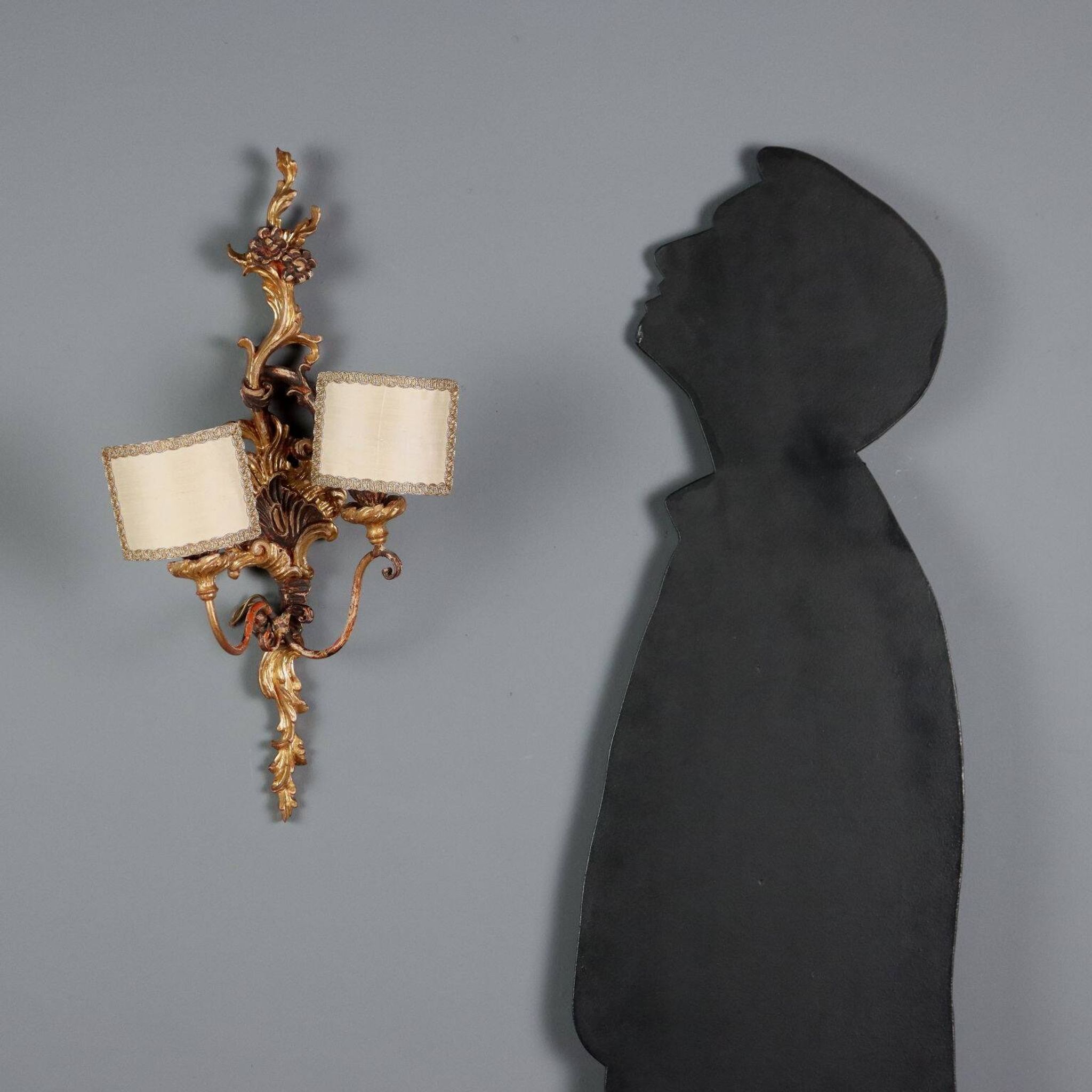 Antique wall sconces in carved lacquered and gilded wood, Italy, 20th century.