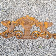 Cast iron pediment with birds