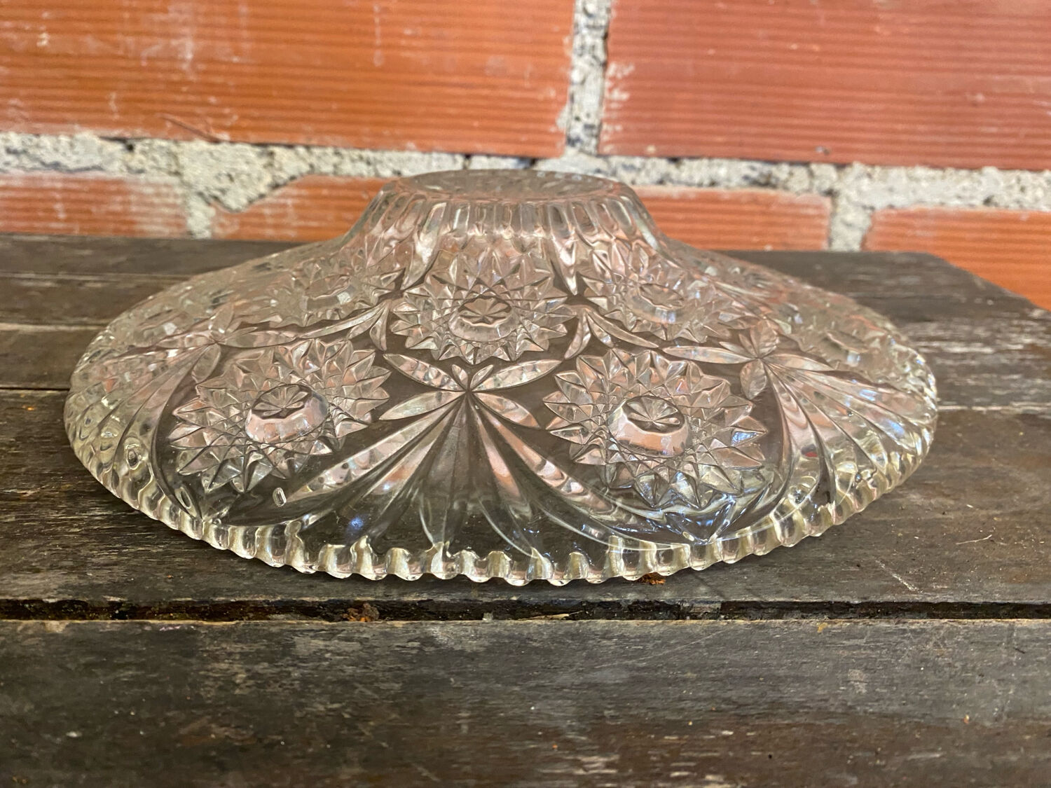 Cut glass fruit bowl with carved star decoration.