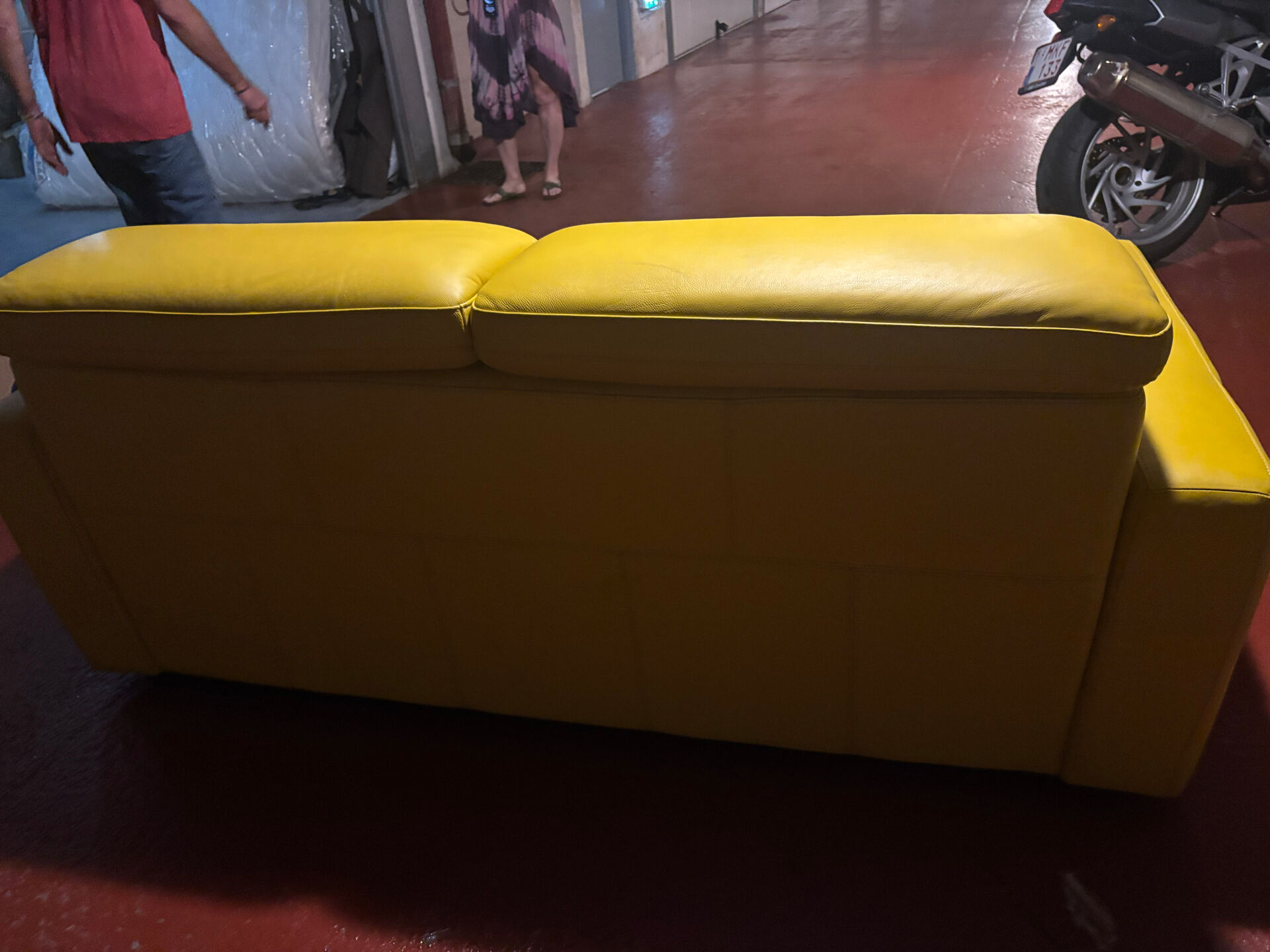 Yellow leather convertible sofa made in Italy.