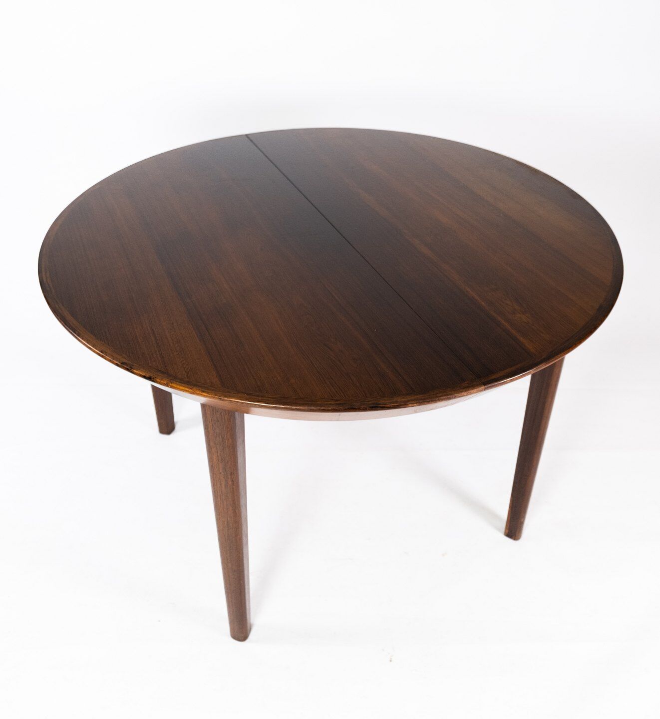 Dining table in rosewood of danish design from the 1960s.