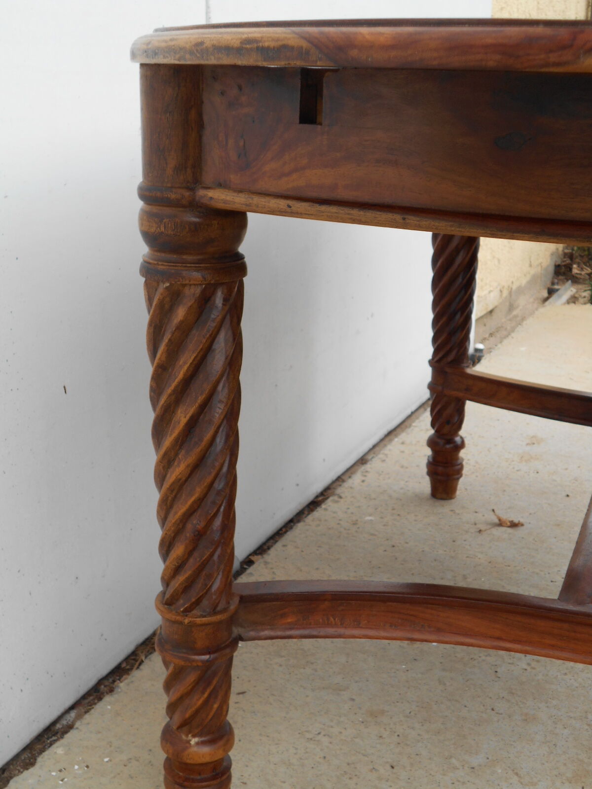 Oval table, integrated extension, in exotic wood