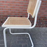 Cesca dining room chair designed by Marcel Breuer