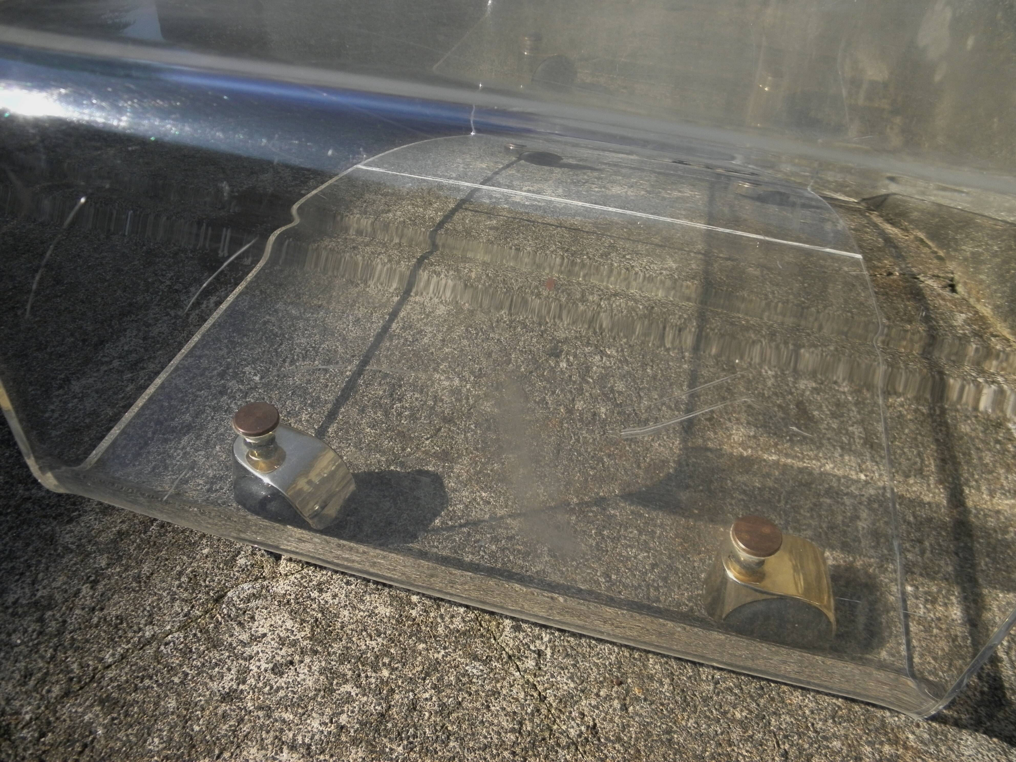 Plexiglass coffee table on wheels